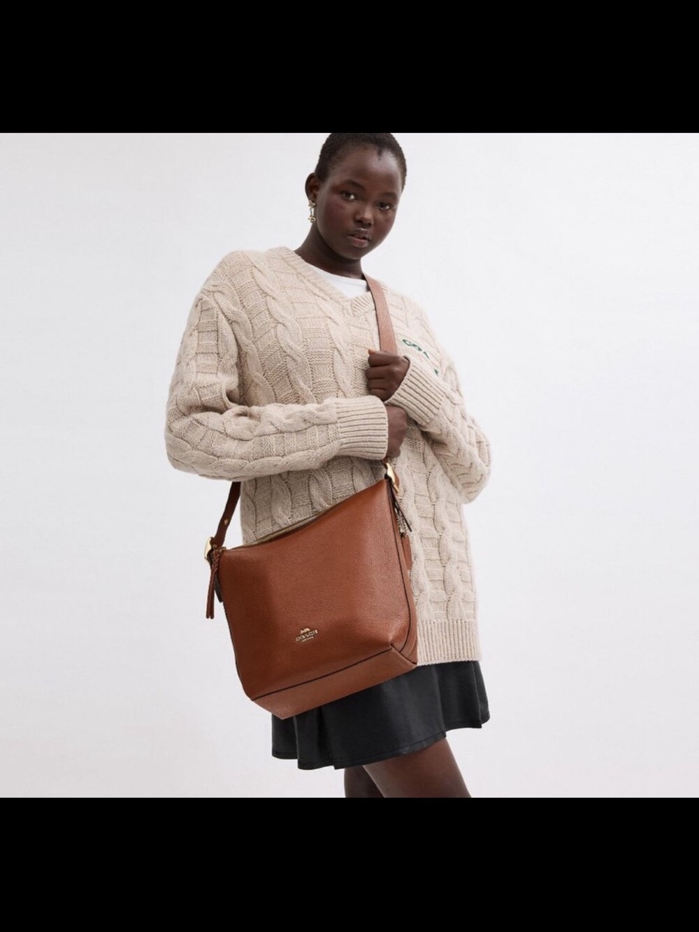 Coach Pebbled Leather Crossbody Bag in Saddle Brown